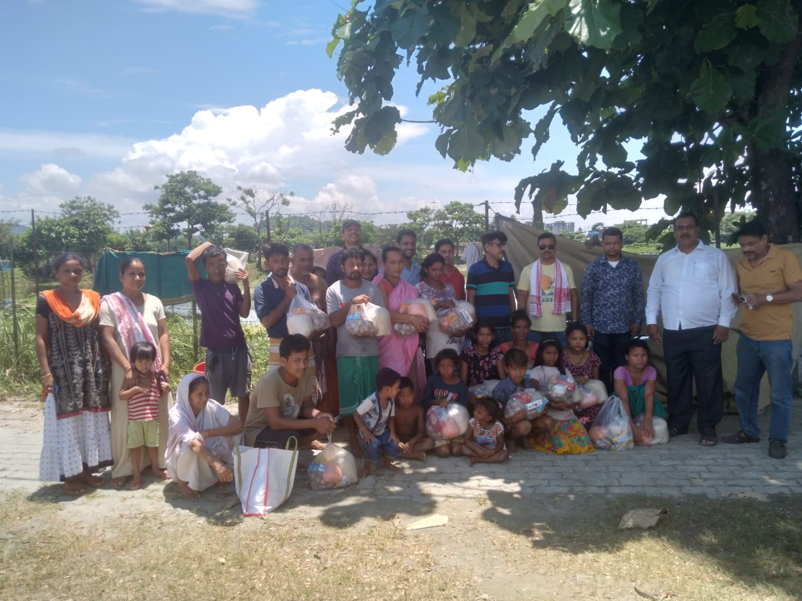 Flood Relief Campaign by members of Alumni Association, North Gauhati College at nearby adopted villages on 25th June, 2022